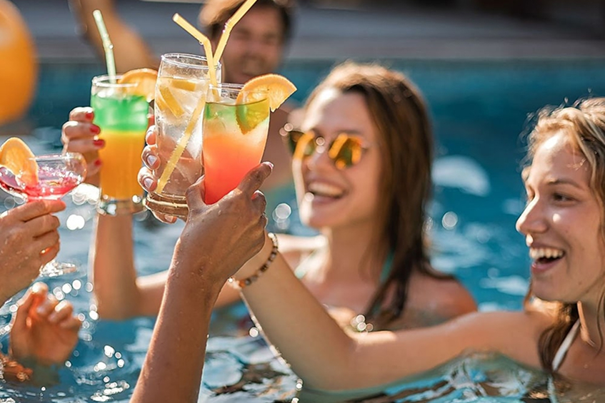 Sun loungers and a lounge area by the pool